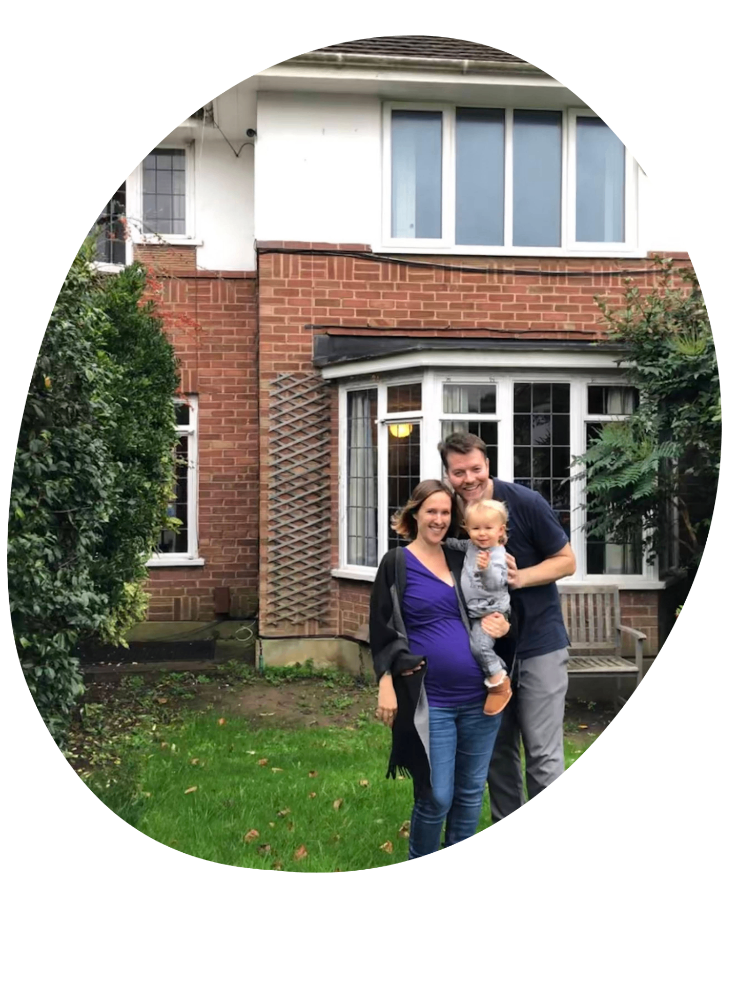 Susi and her family outside their home